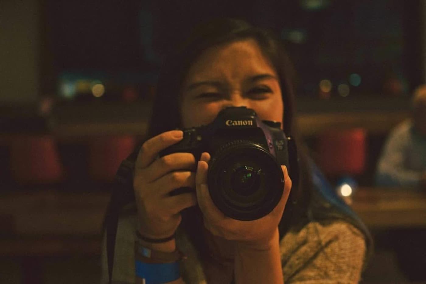 Ash Sumida shooting with a Canon DSLR